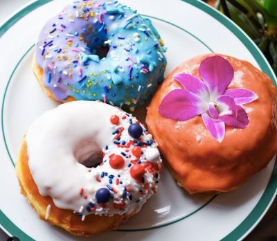 Artisan donuts with various different glazes and decoratives toppings