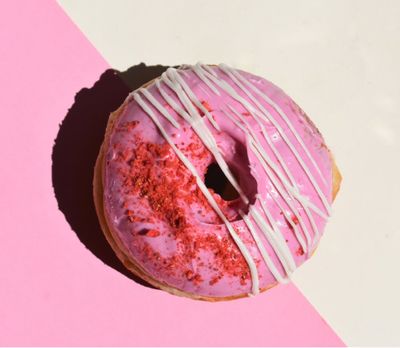 Donut with pink and white glazing